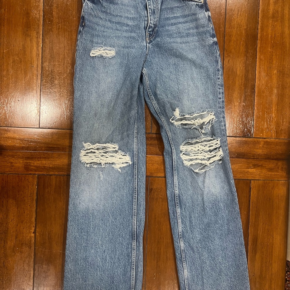 Zara wide leg jeans.  Tears in legs.  Frayed bottoms.